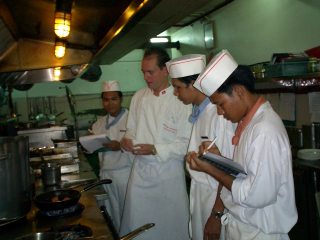 chefs being taught by Stephan Oppenhagen Executive chef